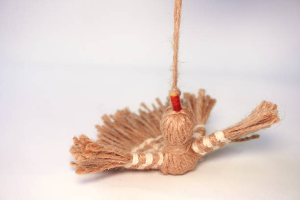 istock Hanging handmade yarn bird with detailed texture 2196274153
