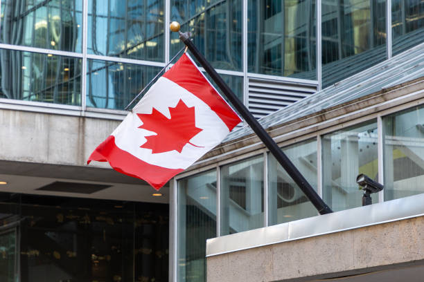 istock Canadian flag on building in downtown Ottawa in Canada 2196278998