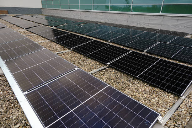 istock Solar Panels Installed on Gravel Surface with Aluminum Mounting Frames 2196279039