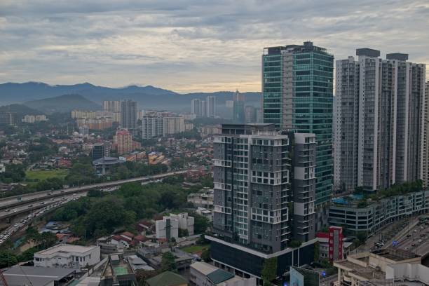 istock Urban Skyline with Mountains and Highway 2196280260