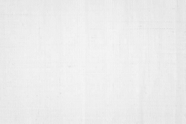 istock White color fabric canvas woven texture background in pattern light blank. Natural gauze linen, carpet wool and cotton cloth textile textured as clean empty for decoration text. Grey sack material. 2196282928