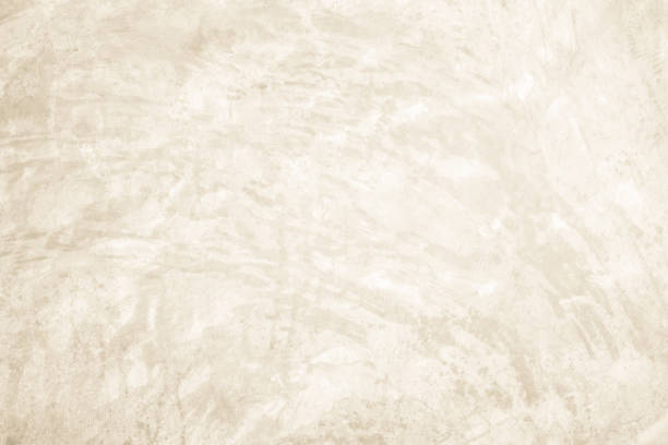 istock Dark old concrete wall texture background. Close Up retro plain cream color cement wall background texture. Design paper vintage parchment element show or advertise or promote product on display. 2196283013