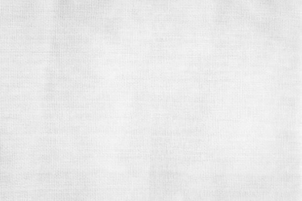 istock White color fabric canvas woven texture background in pattern light blank. Natural gauze linen, carpet wool and cotton cloth textile textured as clean empty for decoration text. Grey sack material. 2196283022
