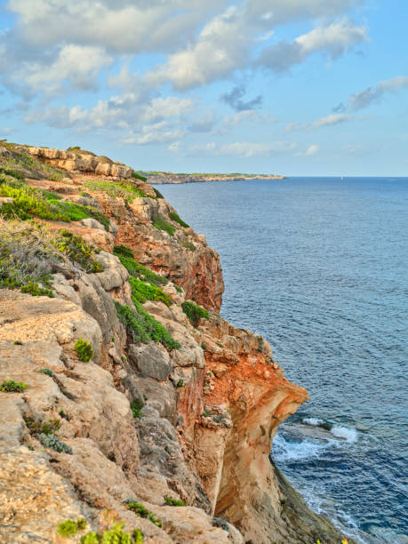 istock Rocky Cliffs Overlooking the Ocean in Mallorca Under a Blue Sky 2196283161
