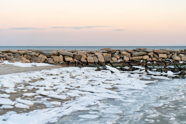 istock Landscape of a beach with snow on the ground 2196284015