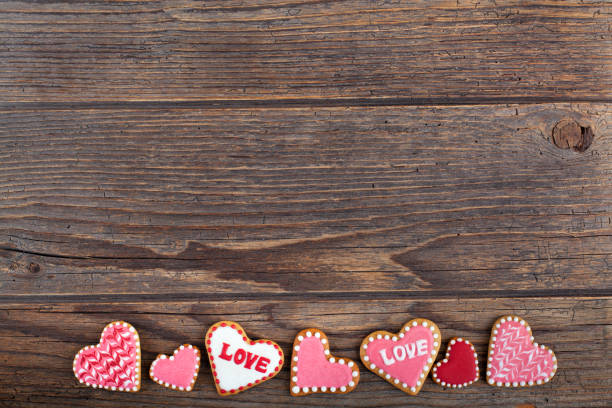 Valentine's heart cookies on rustic wooden background
