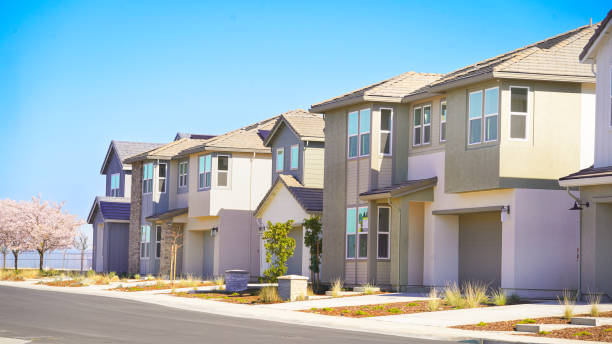 istock Row of Single family homes 2196285343