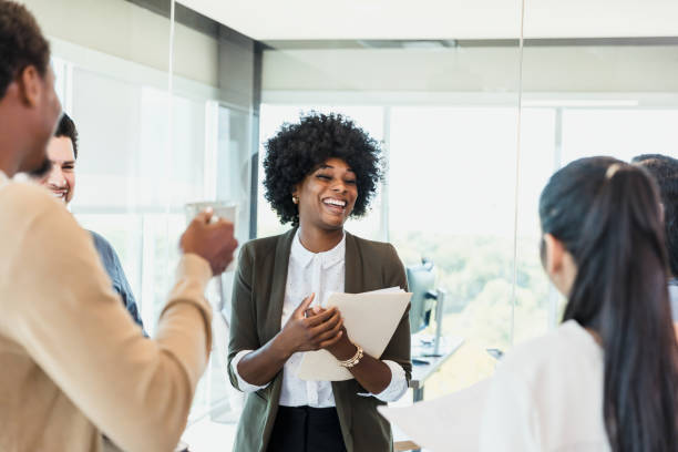 istock Happy Diverse Team Meeting in Modern Office Space 2196289426