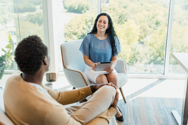 istock Businesswoman Using Tablet in Meeting with Client 2196289443
