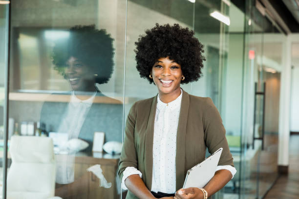 istock Confident Businesswoman Smiling in Modern Office 2196289465