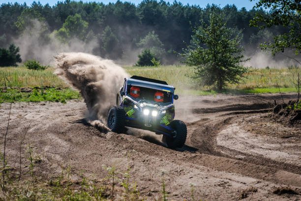 istock ATV, UTV, buggy, rally riding in dusty track. Amateur competitions 2196294176