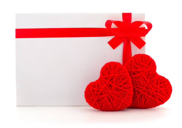 Valentines Day greeting card and red heart isolated on white.