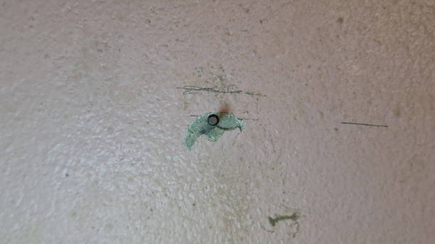 istock Cracks and stains on concrete walls. 2196300350