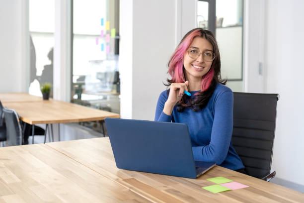 istock Young woman working in the office 2196306953