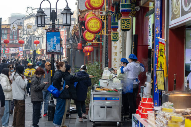 Beijing, China- 11 Nov 2024: View of Dashilan pedestrian street in Beijing. It is a historic Beijing street blending traditional culture with modern shopping, dining, and architecture.