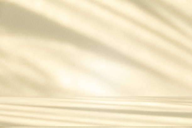 istock Studio style background wall decoration presentation uses white and beige tones. with shadows cast from a nearby window, concept creating a decorative 2196307765