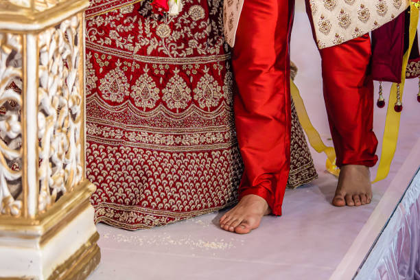 istock Indian Hindu wedding ceremony ritual items feet close up 2196307788