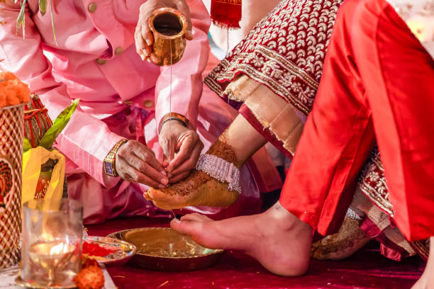 istock Indian Hindu wedding ceremony ritual items feet close up 2196308288