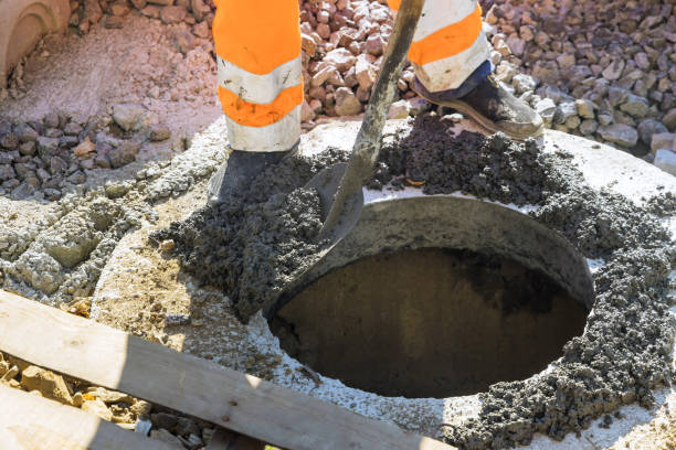 istock Constructed that top border of manhole for a utility pit will be secured by concrete 2196308444