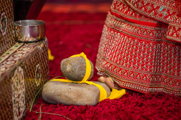 istock Indian Hindu wedding ceremony ritual items feet close up 2196308550