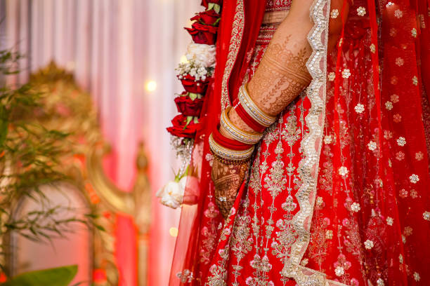 istock Indian Hindu wedding ceremony ritual items hands close up 2196310384