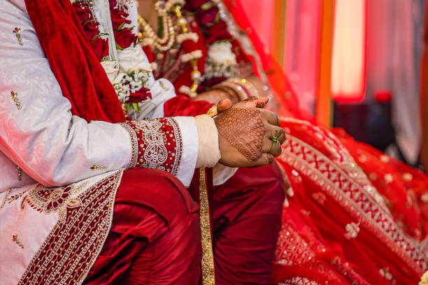 istock Indian Hindu wedding ceremony ritual items hands close up 2196310814