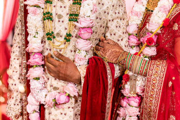 istock Indian Hindu wedding ceremony ritual items hands close up 2196311422