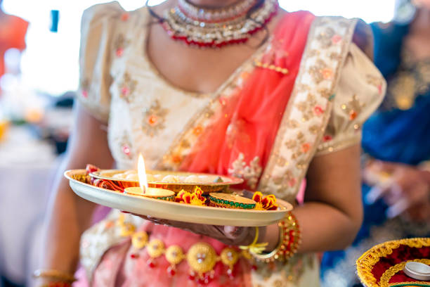 istock Indian Hindu wedding ceremony ritual items hands close up 2196311687