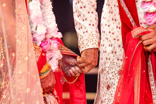 istock Indian Hindu wedding ceremony ritual items hands close up 2196311697