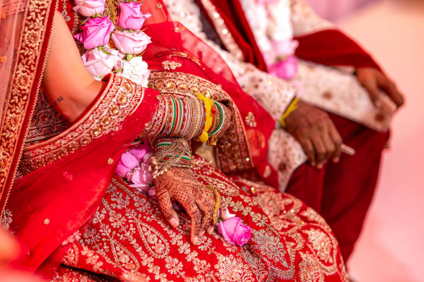 istock Indian Hindu wedding ceremony ritual items hands close up 2196312066