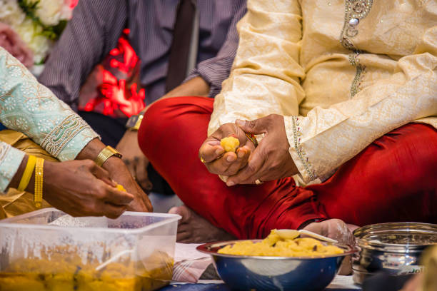 Indian Hindu wedding ceremony ritual items hands close up