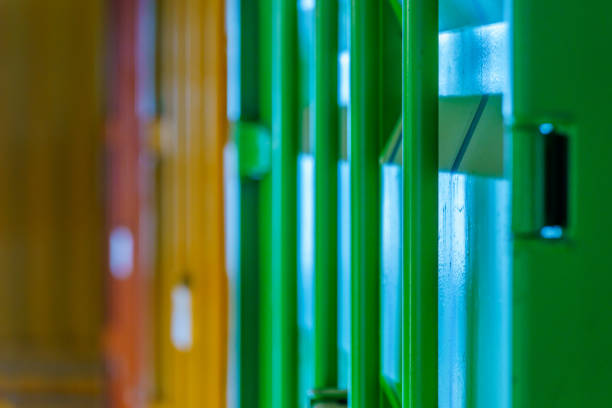 istock Warehouse building with various colorful shipping containers 2196322300