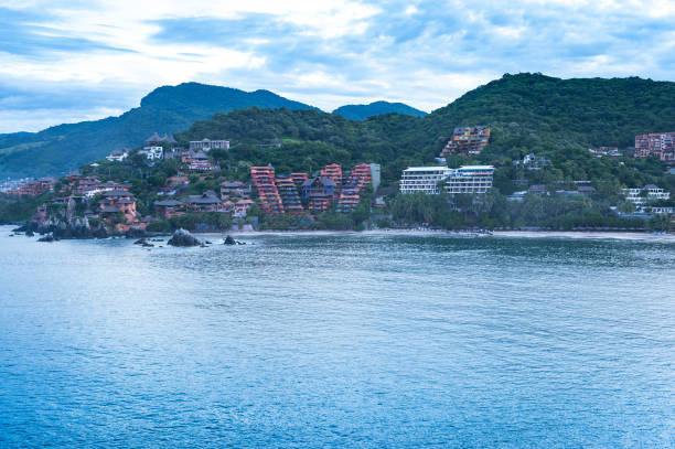 a scenic view of a hotel in Puerto Vallarta seen from the water
