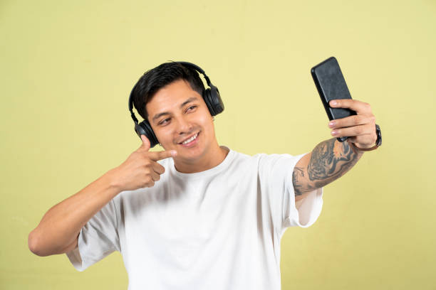 istock Portrait of a man making different poses in a studio 2196325016