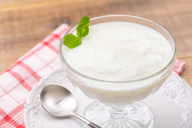 istock Yogurt Mousse Placed on Wooden Table 2196327793