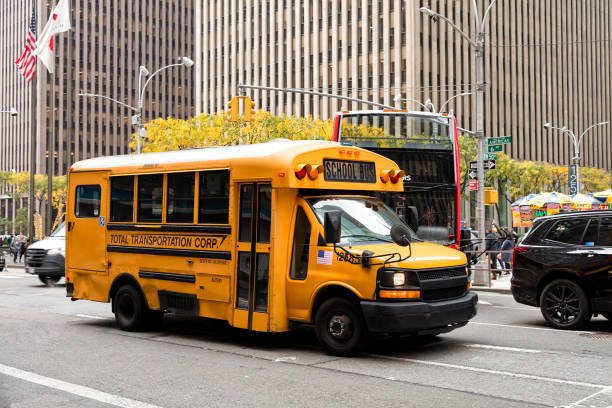 istock School Bus Driving in Manhattan, New York 2196334173