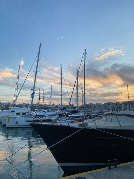 istock Boats in the port at sunset 2196343229