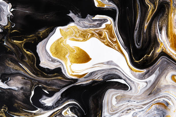 istock Colorful Abstract Marbled Design With Black, White, and Gold Hues Blending Seamlessly 2196344013