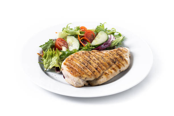 istock Grilled chicken with salad isolated on white background 2196346855