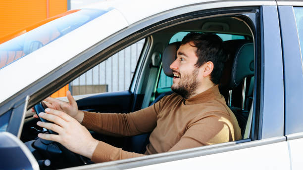 istock A young male guy shows positive emotions and joy, he laughs. 2196348682