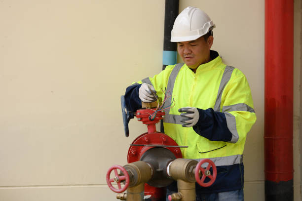 istock Engineers are checking the pipes and valves of the fire pump system. 2196353762