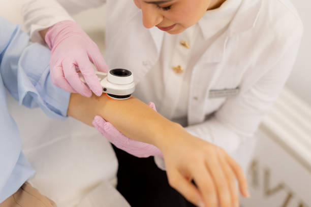 istock Dermatoscope exam reveals skin conditions during a thorough skin evaluation session in a clinical setting 2196356064
