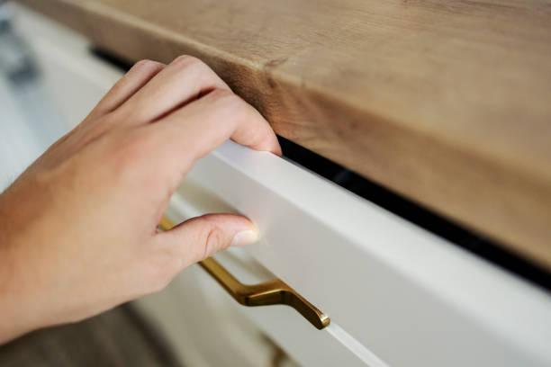 istock Cropped picture of hand opening drawer. 2196362981