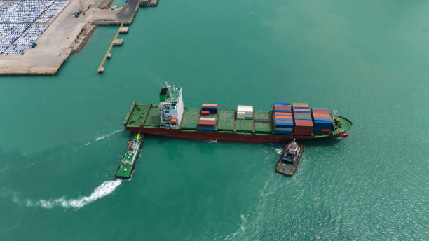 istock Aerial view from a container drone. Container ships in export-import and logistics business Transporting goods to large ports Worldwide shipping and logistics business International business abroad 2196368098