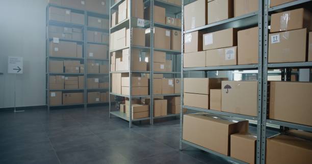 istock Sorting Facility, Storage of Online Store with E-Commerce Orders in Cardboard Boxes 2196369380