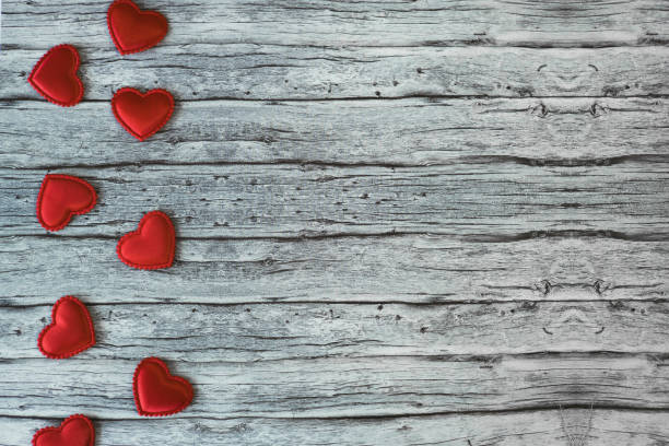 istock Red hearths on wooden background. Valentines Day banner. Space for text 2196371644