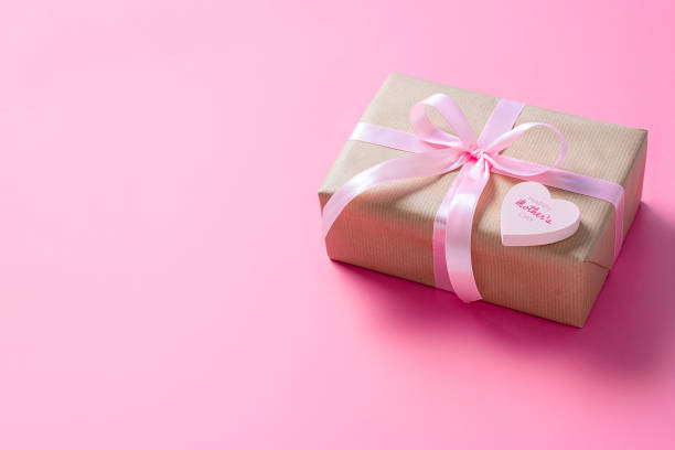 istock Mother's day gift box on pink background. Copy space 2196374645