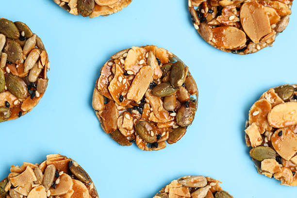 istock Florentine cookies pattern isolated on blue background. 2196375118
