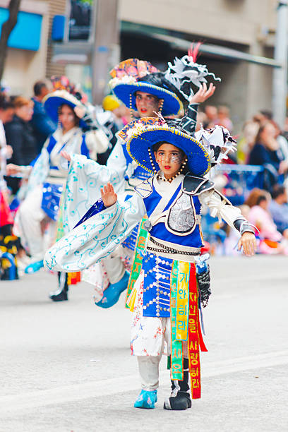 Badajoz, Spain, sunday. February 13 2024. Carnival parade through the streets of Badajoz