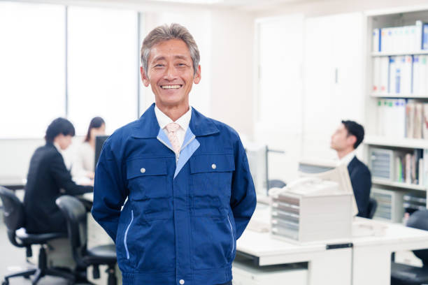 Men in work clothes doing office maintenance and cleaning